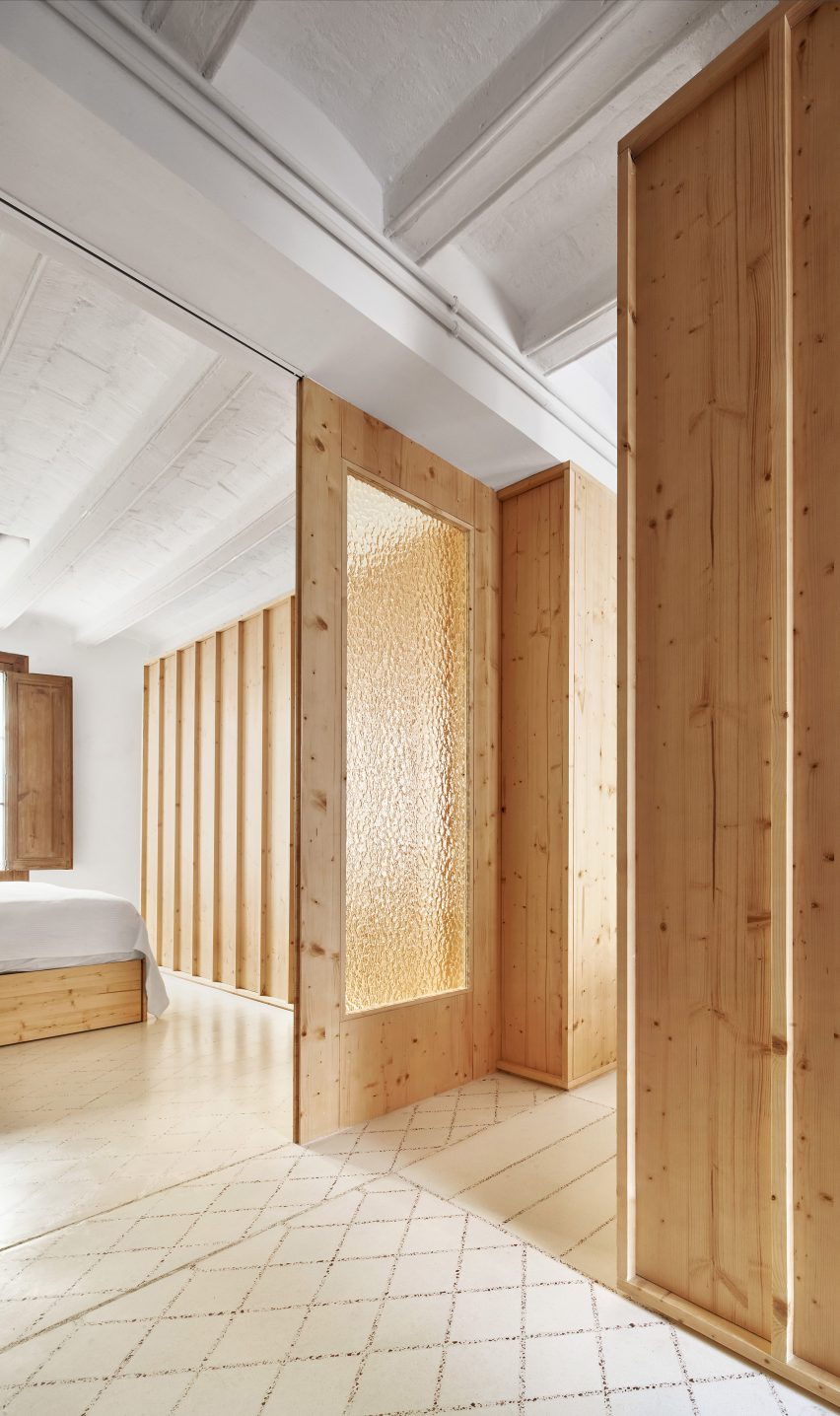 Original tiles are crushed to create a new floor in this Barcelona apartment