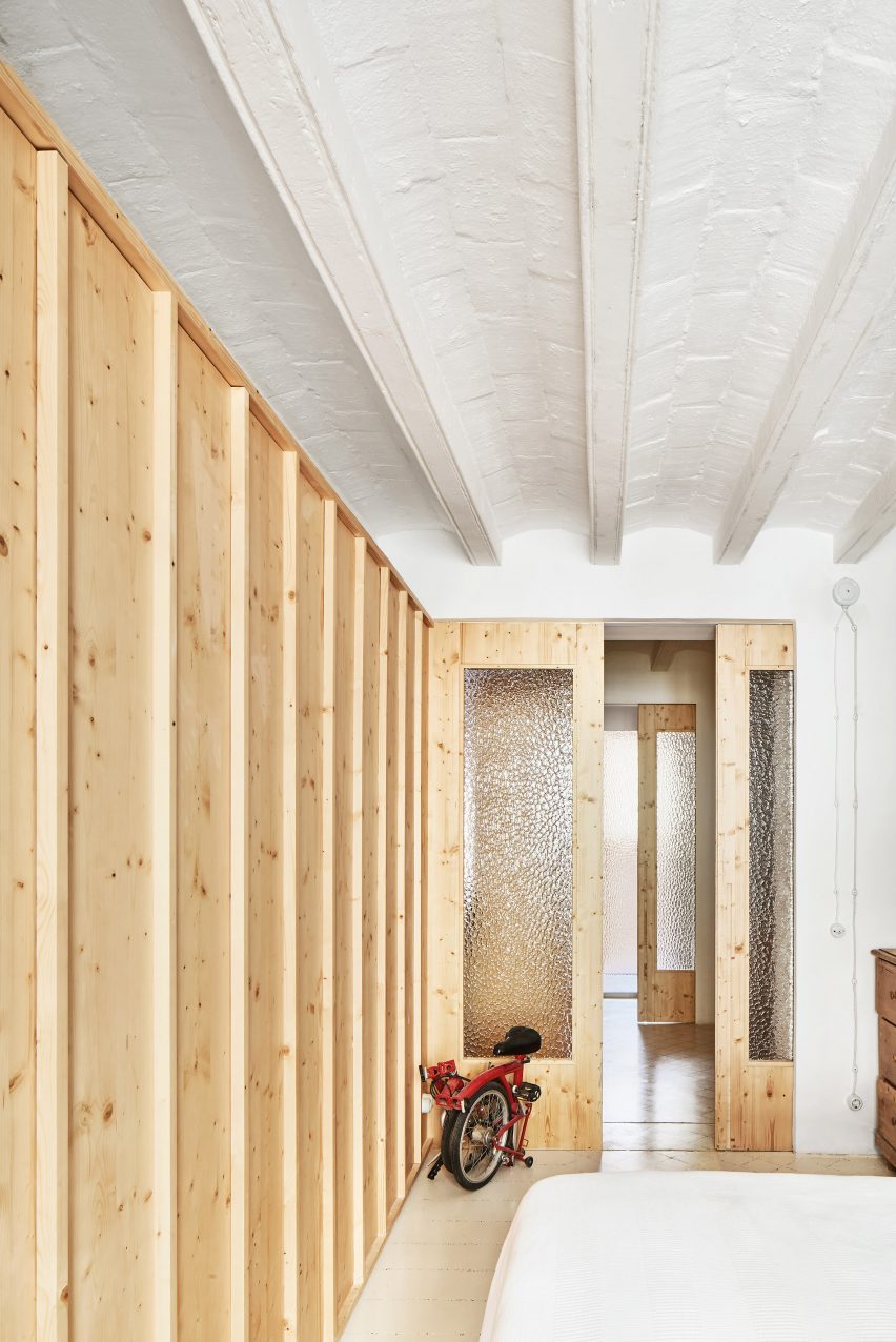 Original tiles are crushed to create a new floor in this Barcelona apartment