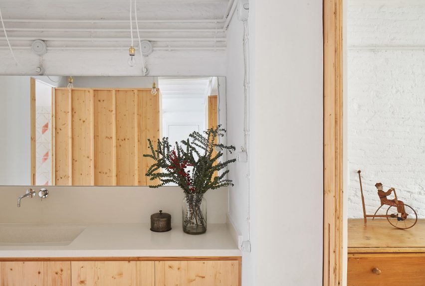 Original tiles are crushed to create a new floor in this Barcelona apartment
