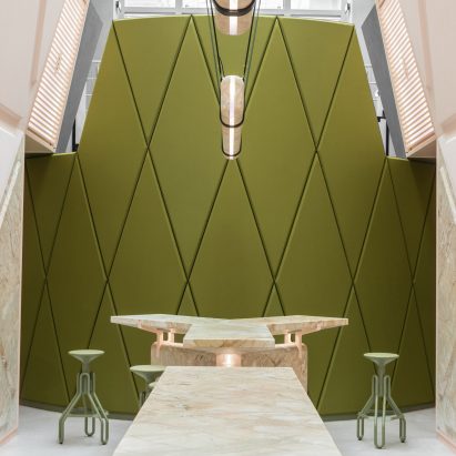 Pink marble surfaces contrast with rich green accents in Ghent’s XYZ Lounge bar
