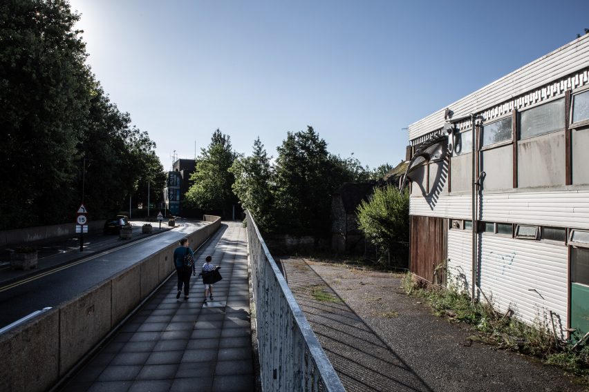 Alex Chinneck unzips the walls of a building in latest installation