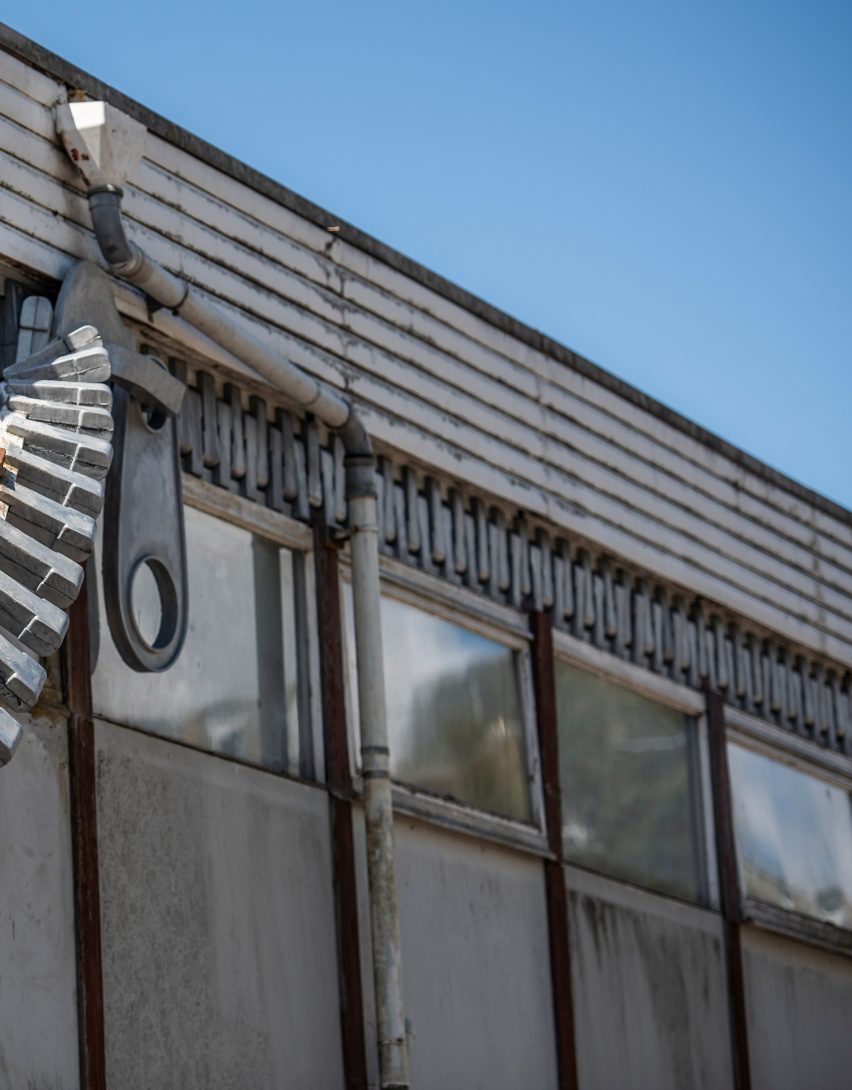 Alex Chinneck unzips the walls of a building in latest installation