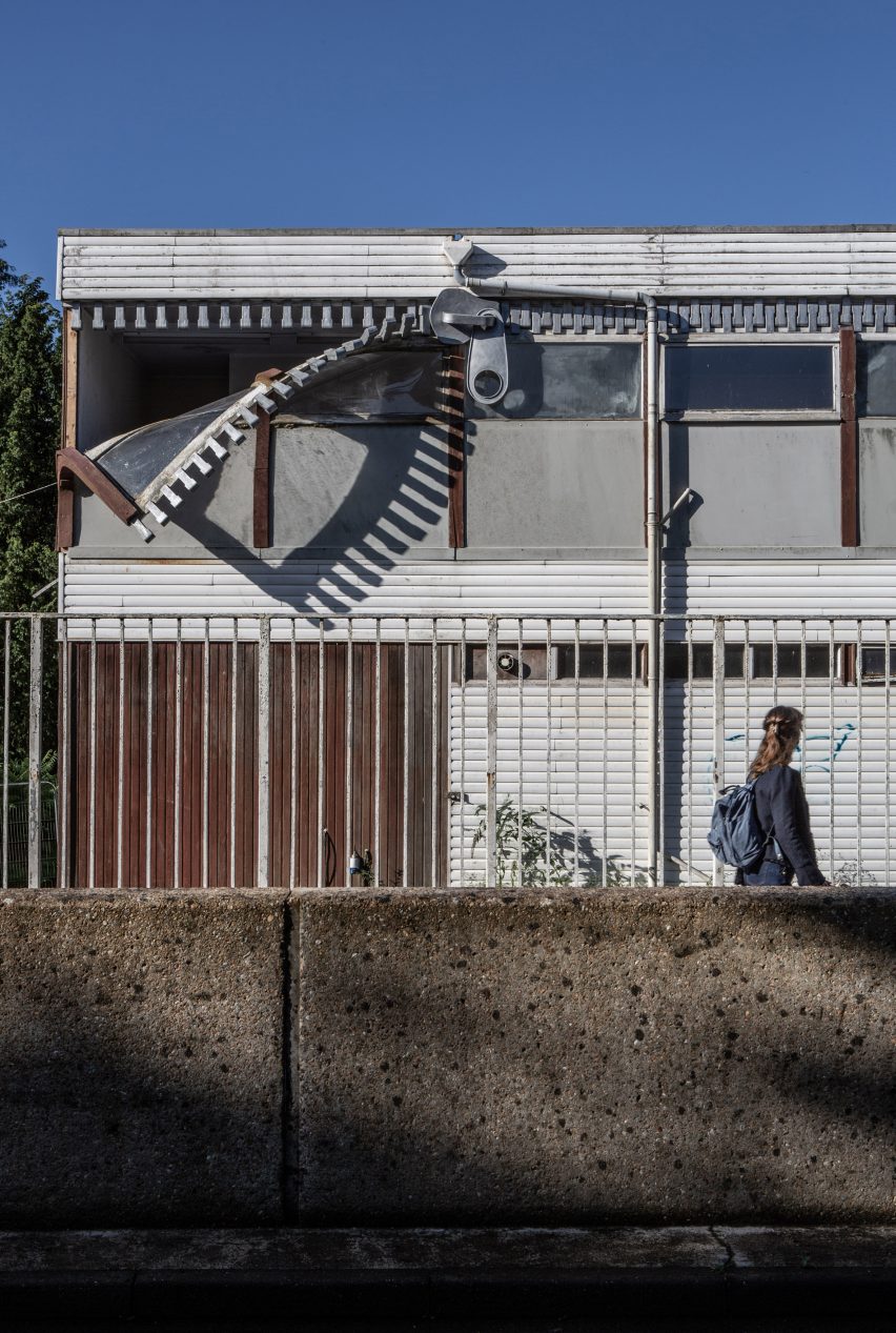 Alex Chinneck unzips the walls of a building in latest installation