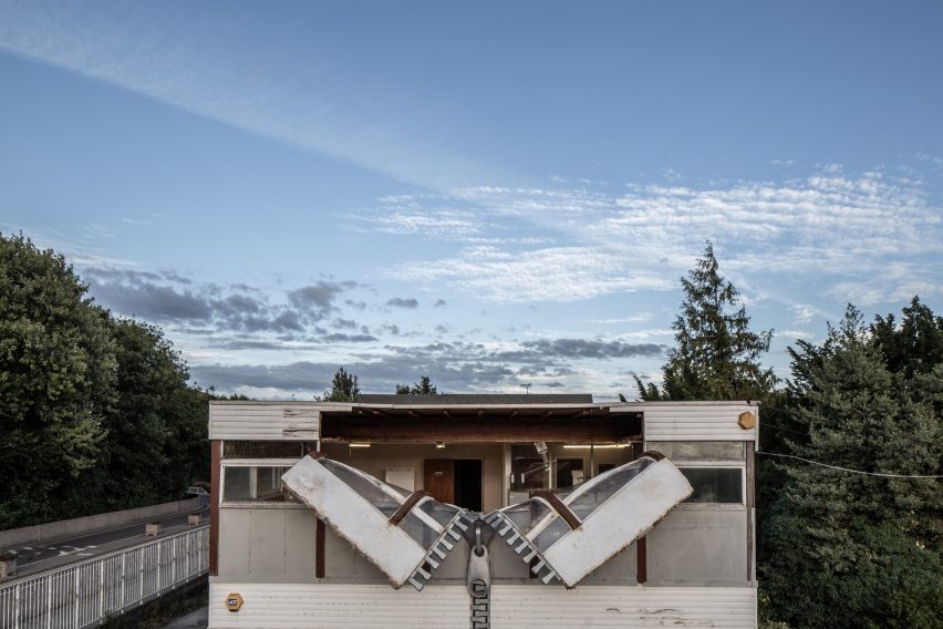 Alex Chinneck unzips the walls of a building in latest installation