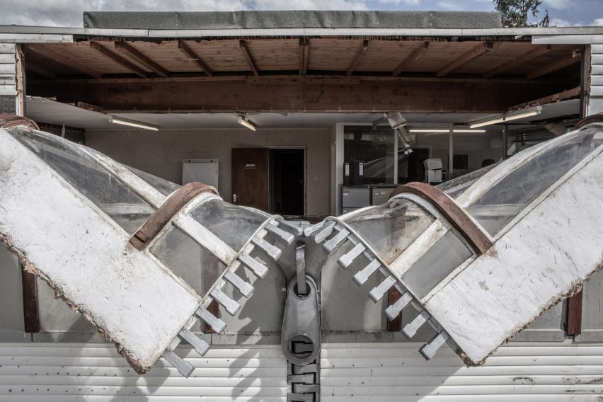 Alex Chinneck unzips the walls of a building in latest installation