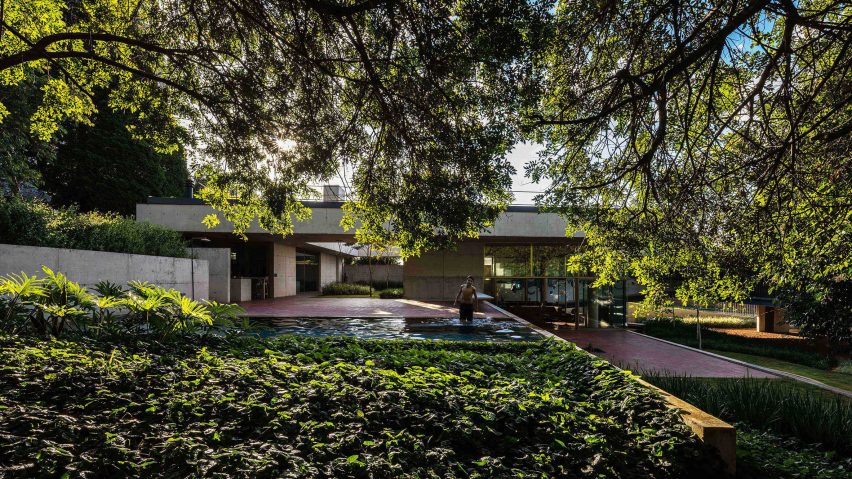 Casa em Cotia in São Paulo features a snaking pond and a rooftop garden