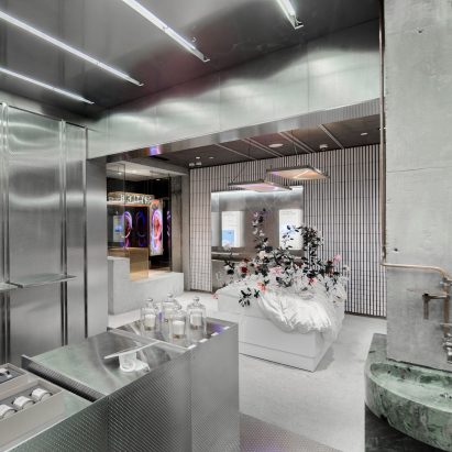 Neri&Hu animates Little B store in Shanghai with white-glazed tiles and neon lights