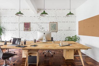Plywood and plants feature in Solo Arquitetos' studio in Brazil
