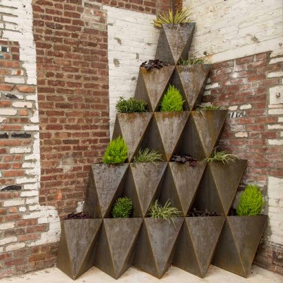 Prism Planters by The Principals stack up into arches and pyramids