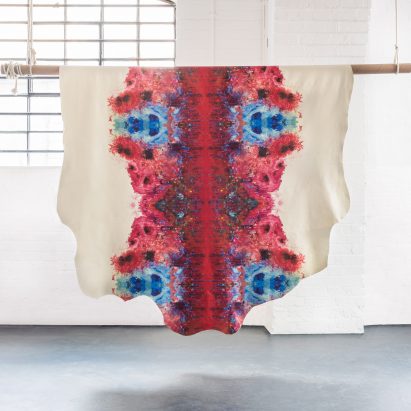 Graphic leather hide by Timorous Beasties features splatters and dribbles of colour 