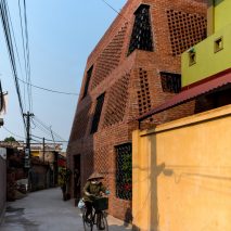 H&P Architects wraps perforated brick walls around Hanoi house Brick Cave