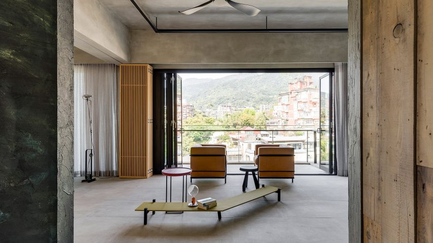 Pared-back interiors form relaxed dwelling for retired couple in Taipei