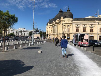 Artist paints impermanent white circle around the Romanian National Museum of Art