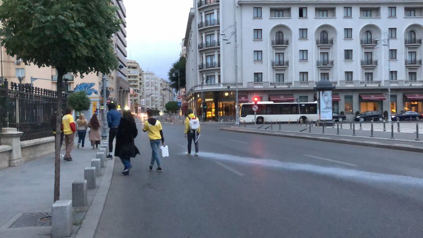 Artist paints impermanent white circle around the Romanian National Museum of Art