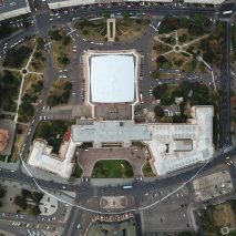 Artist paints impermanent white circle around the Romanian National Museum of Art