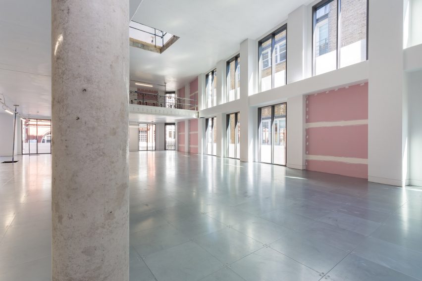 Iridescent turquoise tiles cover Damien Hirst's new flagship studio by Stiff + Trevillion