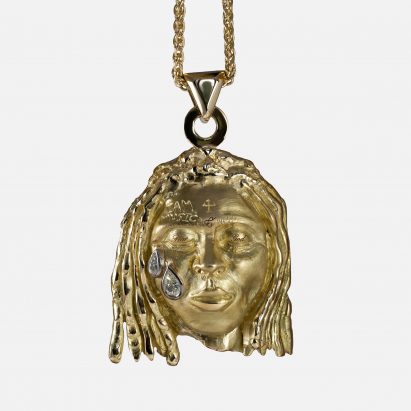Joy BC pays off university fees with hand-carved pendant of Lil Wayne
