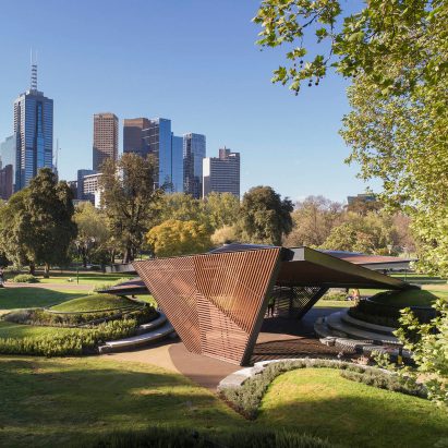 Carme Pinós unveils origami-inspired MPavilion raised up on grass mounds