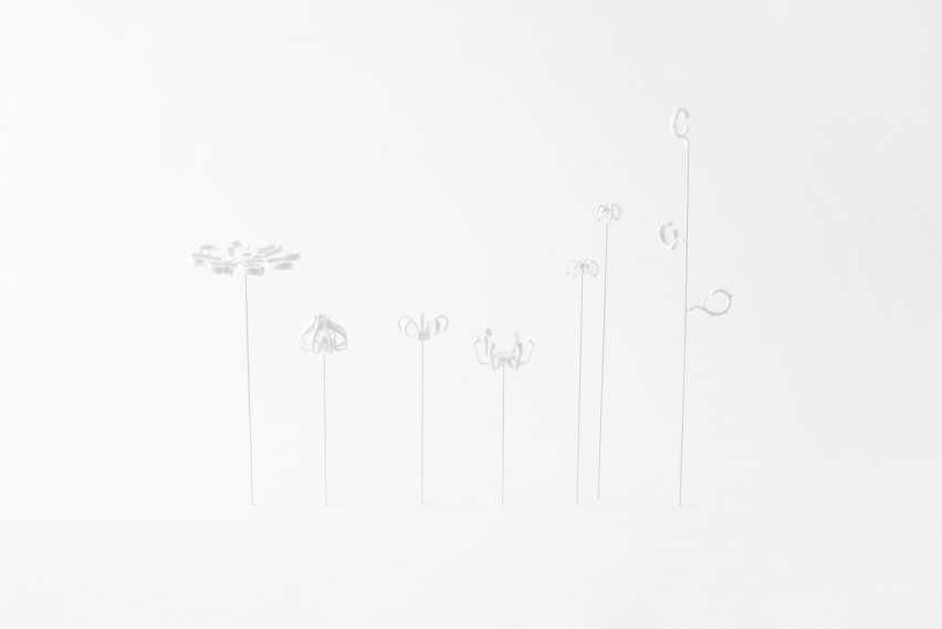 Nendo uses Sèvres porcelain to make flowers from handles and a lilypad table