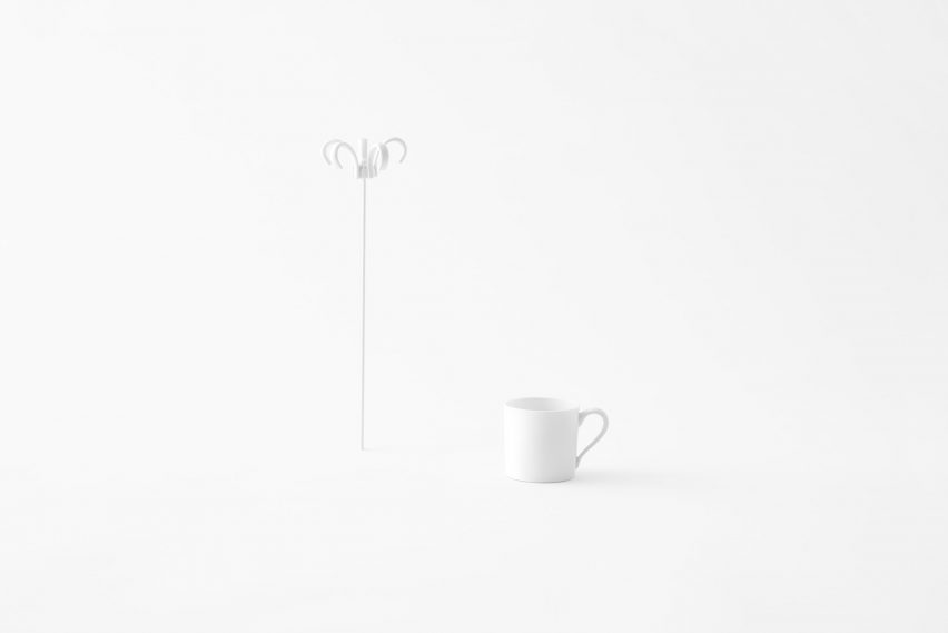 Nendo uses Sèvres porcelain to make flowers from handles and a lilypad table