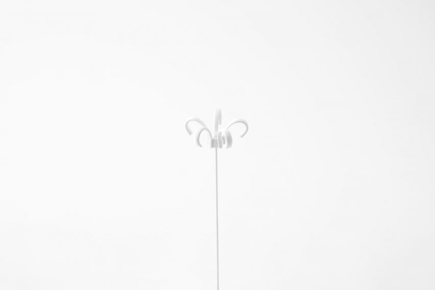 Nendo uses Sèvres porcelain to make flowers from handles and a lilypad table