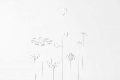 Nendo uses Sèvres porcelain to make flowers from handles and a lilypad table