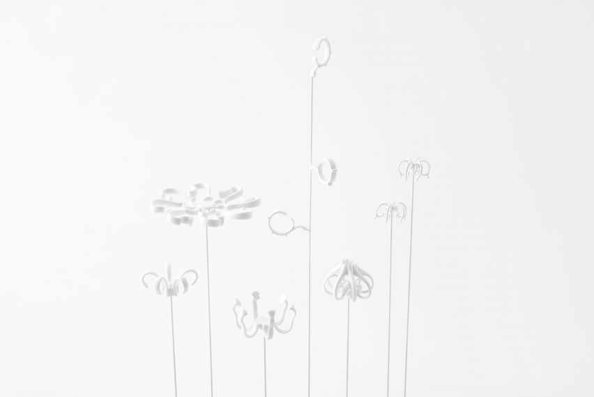 Nendo uses Sèvres porcelain to make flowers from handles and a lilypad table