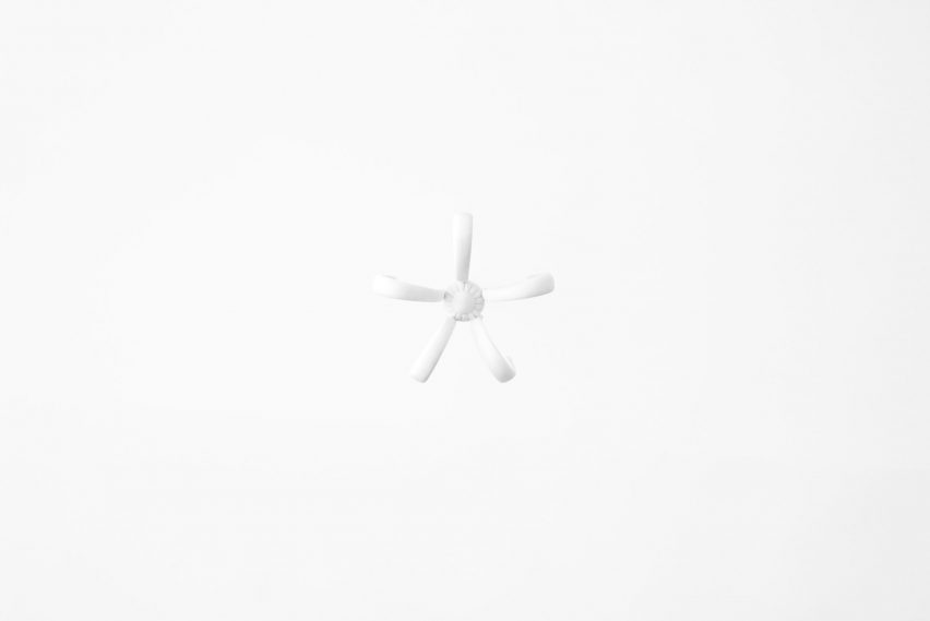 Nendo uses Sèvres porcelain to make flowers from handles and a lilypad table