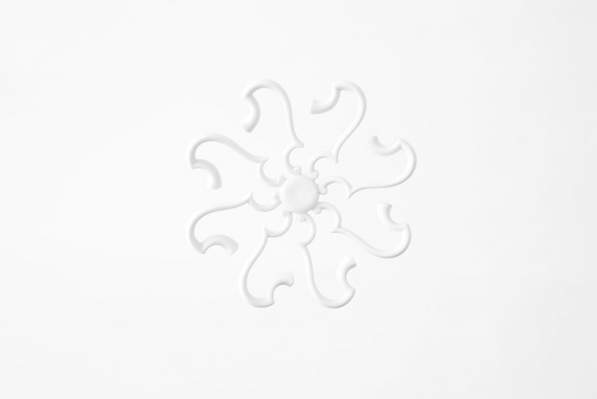 Nendo uses Sèvres porcelain to make flowers from handles and a lilypad table