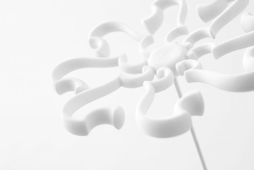 Nendo uses Sèvres porcelain to make flowers from handles and a lilypad table