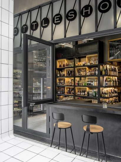 Architectural studio Designreserve have created a liquor store-cum-bar in Sanlitum, Beijing