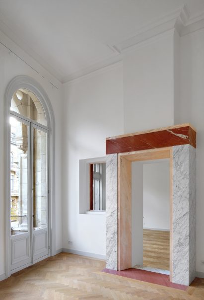Bovenbouw transforms trio of historic buildings into unique apartments on Antwerp's busiest shopping street