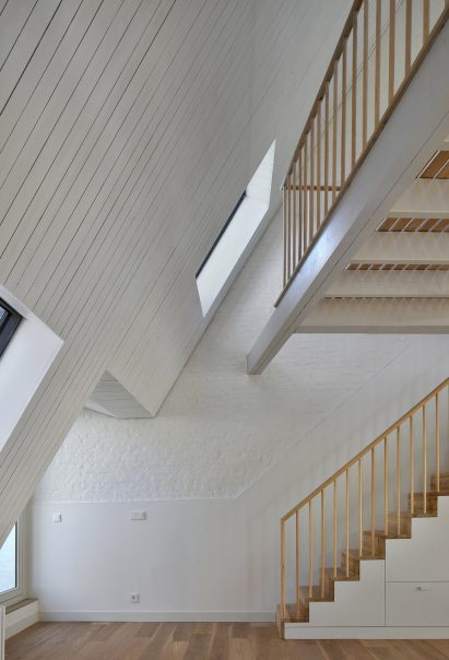 Bovenbouw transforms trio of historic buildings into unique apartments on Antwerp's busiest shopping street