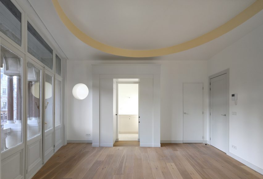 Bovenbouw transforms trio of historic buildings into unique apartments on Antwerp's busiest shopping street