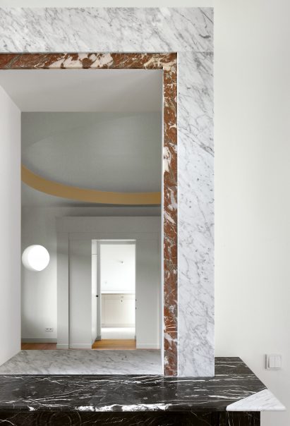 Bovenbouw transforms trio of historic buildings into unique apartments on Antwerp's busiest shopping street