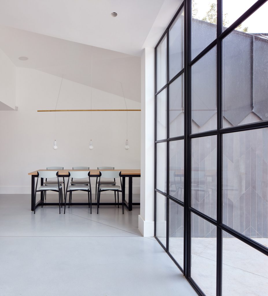 Merrett Houmøller Architects has renovated and extended a townhouse in north London