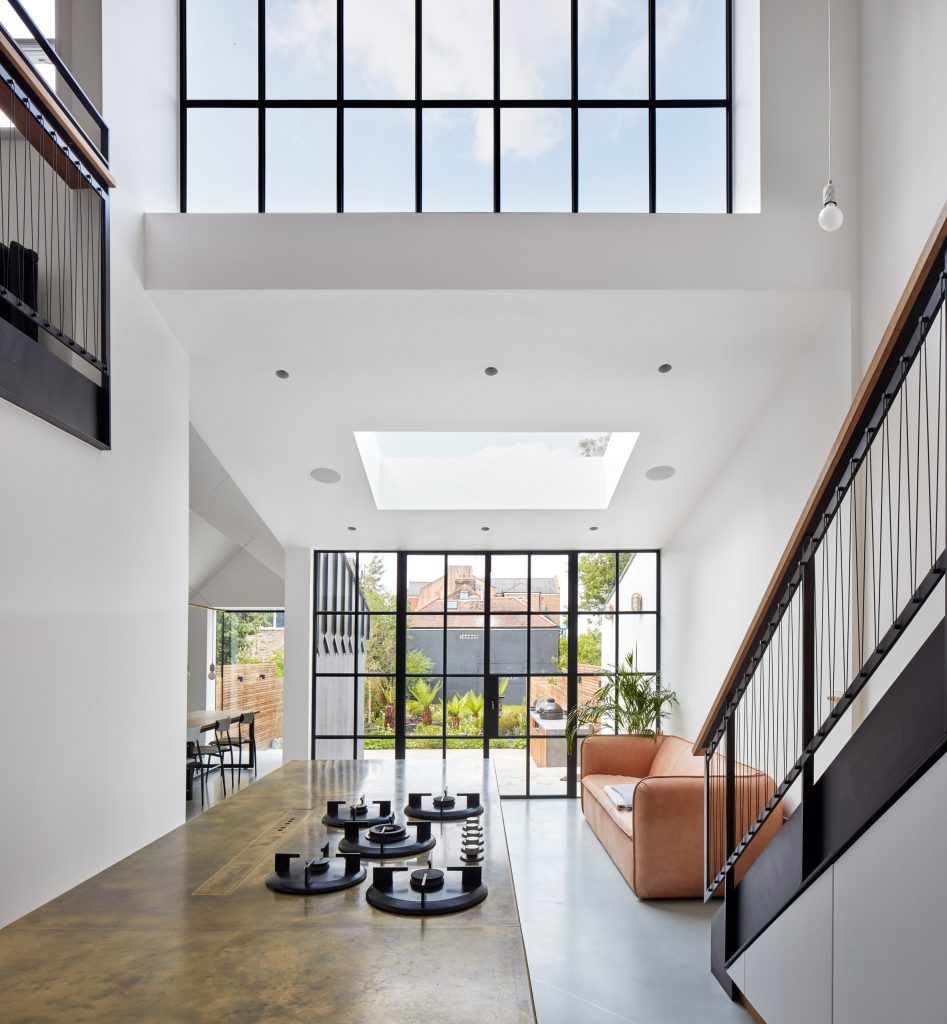 Merrett Houmøller Architects has renovated and extended a townhouse in north London