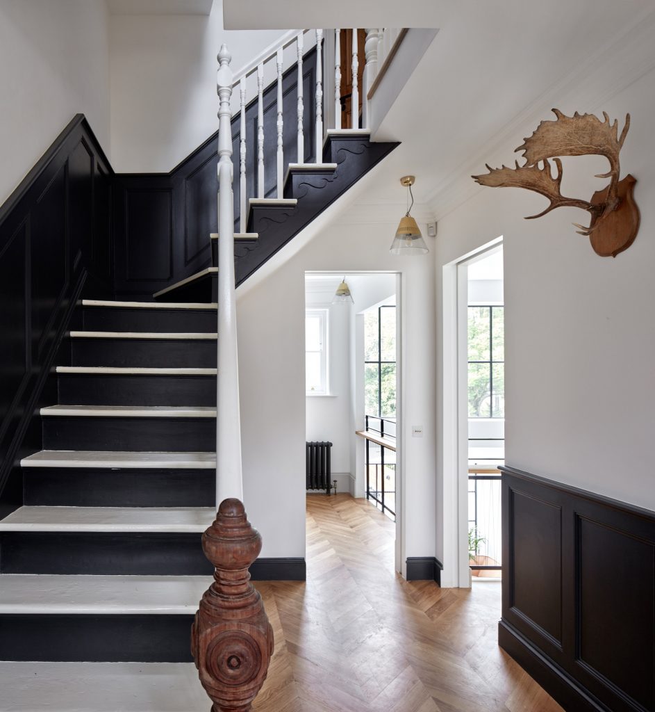 Merrett Houmøller Architects has renovated and extended a townhouse in north London