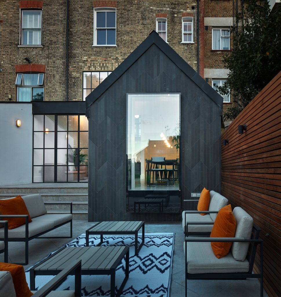 Merrett Houmøller Architects has renovated and extended a townhouse in north London