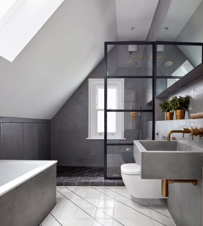 Merrett Houmøller Architects has renovated and extended a townhouse in north London