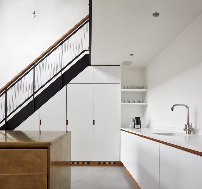 Merrett Houmøller Architects has renovated and extended a townhouse in north London