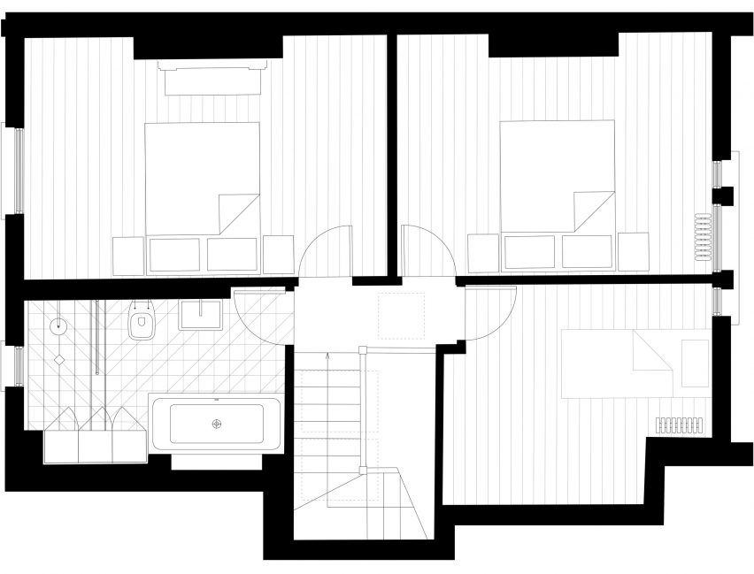 Merrett Houmøller Architects has renovated and extended a townhouse in north London