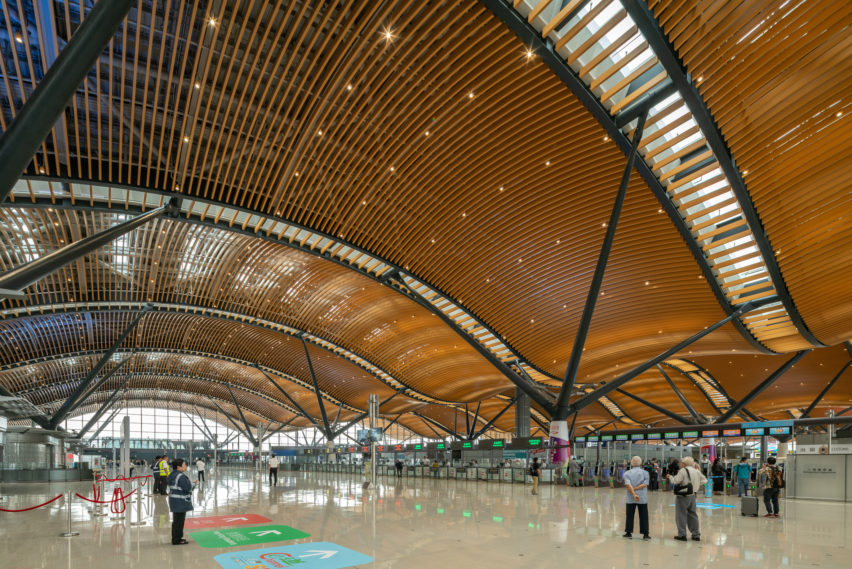 The Passenger Clearance Building by Rogers Stirk Harbour + Partners and Aedas in Hong Kong