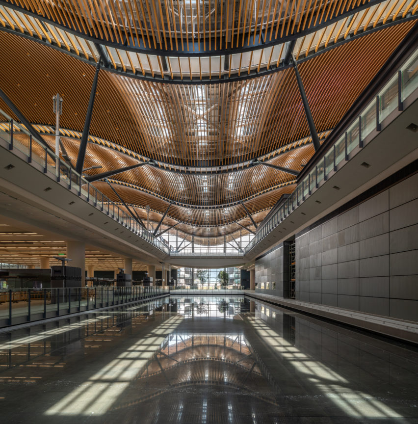 The Passenger Clearance Building by Rogers Stirk Harbour + Partners and Aedas in Hong Kong