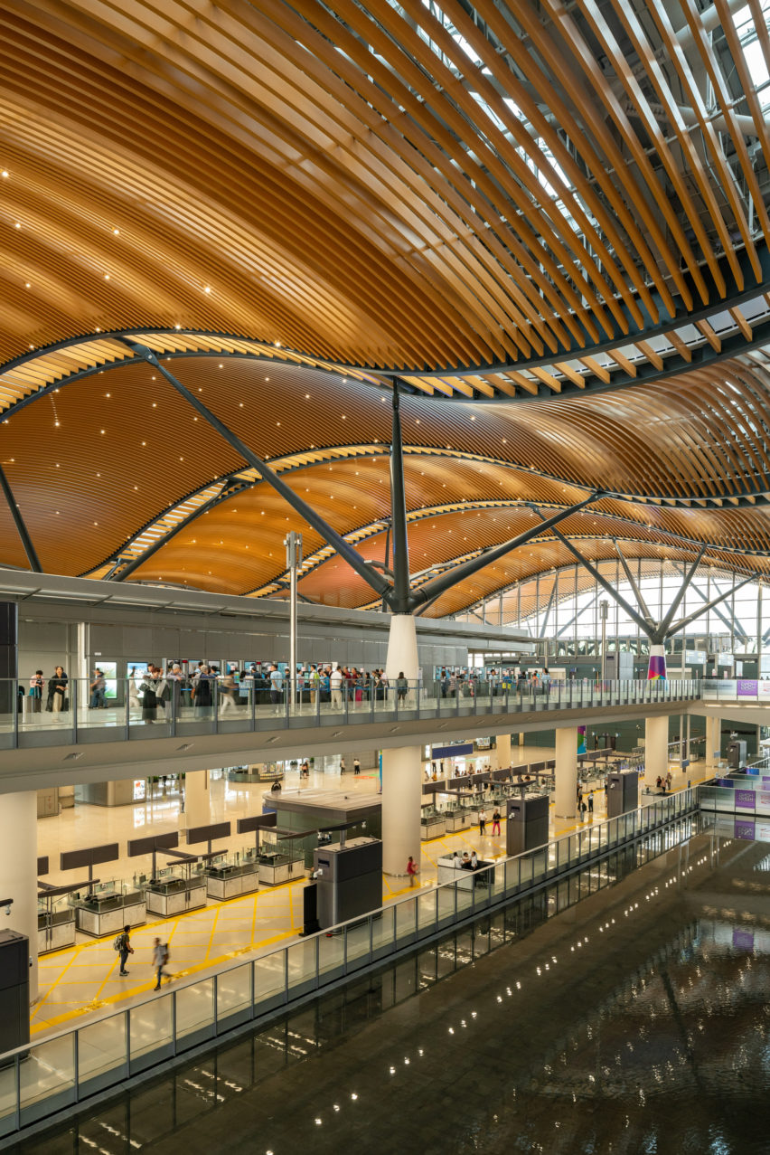 The Passenger Clearance Building by Rogers Stirk Harbour + Partners and Aedas in Hong Kong