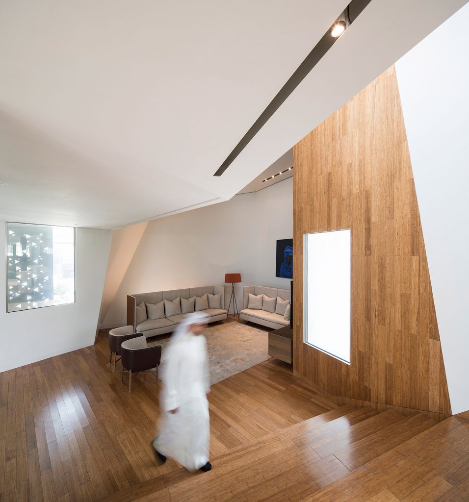 AGi Architects' Rock House features "origami-like" stone facades