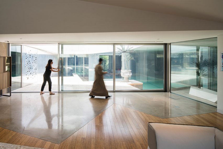 AGi Architects' Rock House features "origami-like" stone facades