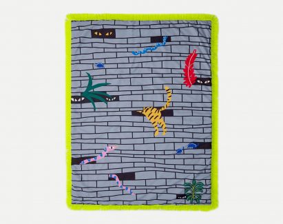 Egle Zvirblyte creates blankets for Sancal patterned with tigers and bananas