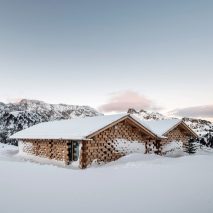 NOA extends historic Alpine retreat with cluster of cosy wooden chalets