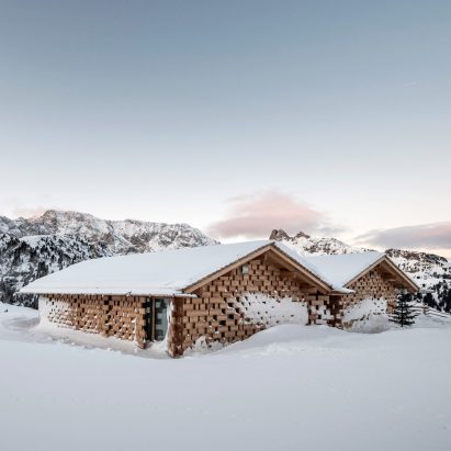 NOA extends historic Alpine retreat with cluster of cosy wooden chalets